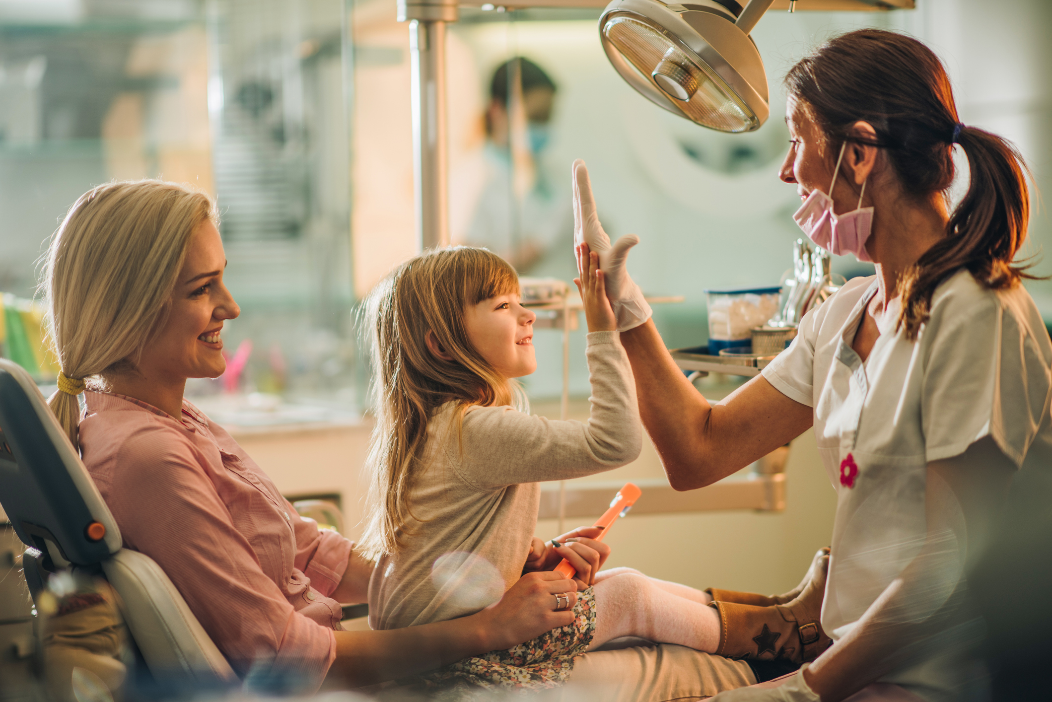 Dentist treating a young child