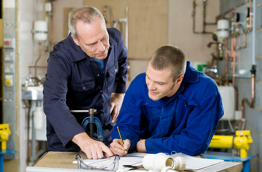 Plumbers discussing content marketing ideas