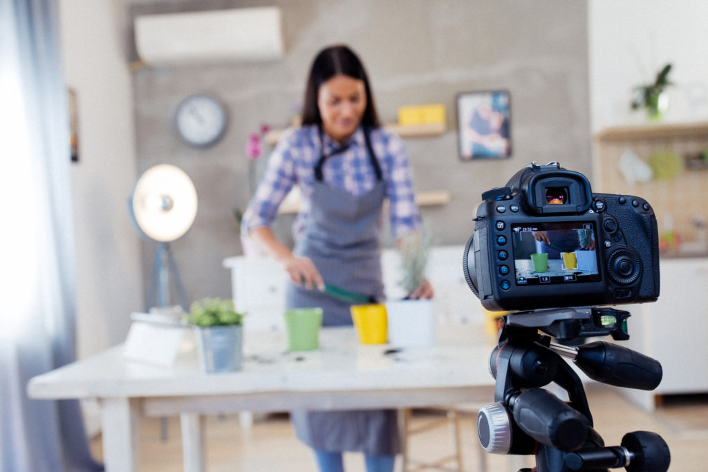 Owner of a plant store creating video content